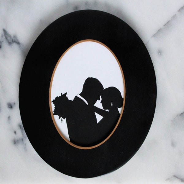 Black wood oval frame - 5" x 7", gold trim or distressed