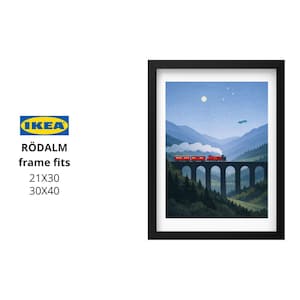 May include: Framed art print featuring a red train crossing a stone bridge in a mountain landscape. The sky is blue with a moon and stars. The frame is black. The print is designed to fit IKEA R&Ouml;DALM frames, sizes 21x30 and 30x40 inches.