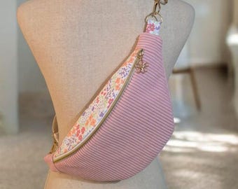 Women's candy pink corduroy fanny pack with floral print, available in several sizes