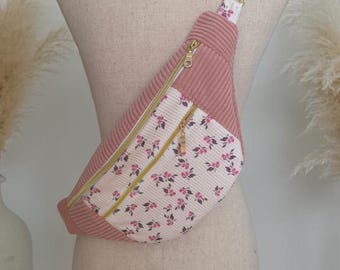 Women's pink corduroy fanny pack with floral pattern