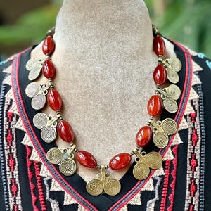 Ancient Influence, elegant contemporary vibe, luscious carnelian and cast brass spirals necklace