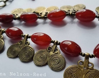 Ancient Influence, elegant contemporary vibe, luscious carnelian and cast brass spirals necklace