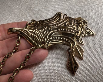 Kalevala Bird of Uhtua pendant reproduction of an ancient Finnish pendant golden Capercaillie pendant
