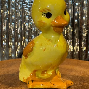 Yellow and Orange Ceramic Duckling Vintage 1985 dated with initials.
