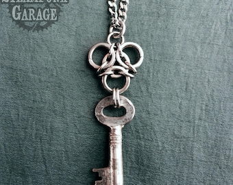 Biohazard Aura Pendant with Antique Key