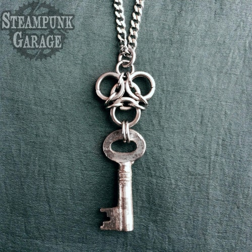 Biohazard Aura Pendant with Antique Key