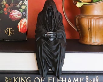 3D-geprint zittend spookdecor – grillig griezelig boekenplankaccent