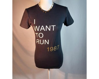 Camiseta American Apparel para mujer, talla pequeña, negra, con el eslogan "I Want To Run 1987"