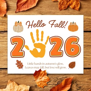 May include: A white rectangular print featuring the text Hello Fall! and the year 2026 with an orange handprint replacing the zero. Two pumpkins and two leaves decorate the corners. The text Little hands in autumn's glow, Leaves may fall, but love will grow is printed at the bottom.