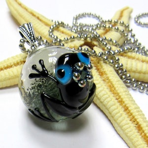 glass pendant, with frog, glittering inside, lampwork image 1