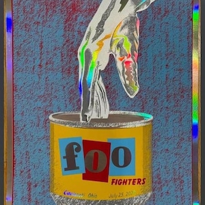 May include: A silver hand reaches down into a yellow can with the word "foo" printed in red and silver letters. The can has the words "FIGHTERS" and "Cincinnati, Ohio July 25, 2021" printed on it.
