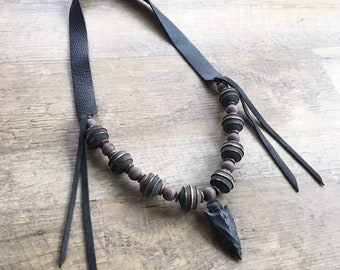 Black Leather Strap Necklace with Black Arrowhead and Vintage Rustic Wooden Beads in Shades of Berry by Stacy Leigh