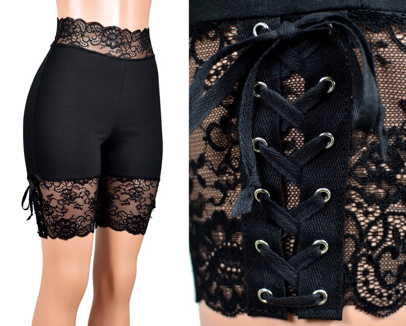 May include: Black shorts with black lace trim and a lace-up back detail.