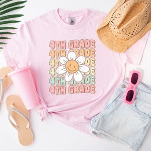 Groovy 4th Grade T-Shirt Retro Back To School Tee First Day of Fourth Grade Shirt for Teacher and Student Classroom Graphic Top