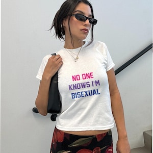 No One Knows I&#39;m Bisexual Baby Tee, Funny LGBTQ Pride Y2K Crop Top, Bi Pride Month Shirt, Cute Queer Aesthetic Fitted Graphic Tee