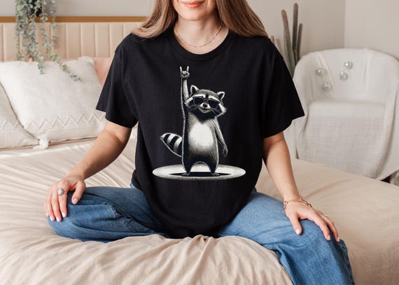 Funny Raccoon Graphic Tee – 'Rock On' Design, Adorable Animal Lover Shirt, Quirky Casual Wear, Playful and Unique Gift Idea