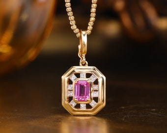 Ciondolo ottagonale in oro 18k con zaffiro rosa e alone di diamanti