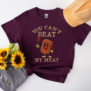 You Can&#39;t Beat My Meat T-Shirt | Funny Barbecue Grilling BBQ Lover Tee | BBQ Party Graphic Shirt for Men & Women