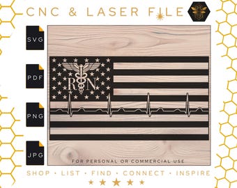 May include: A black and white American flag design with a stylised medical caduceus and the letters "RN" in the centre. The flag is superimposed on a wood grain background. The text "FOR PERSONAL OR COMMERCIAL USE" is at the bottom of the image.
