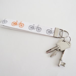 Bicycle fey fob wristlet, white, grey and orange bicycle fabric, cyclist gift, gifts for cyclists, bike lover, gifts for her, gifts for him