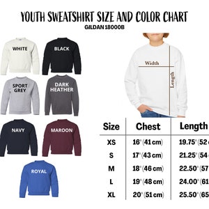 May include: A youth sweatshirt size and colour chart. The chart displays sweatshirts in white, black, sport grey, dark heather, navy, maroon, and royal blue. Measurements are provided in cm for chest and length.
