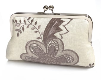 Flower belle, embroidered linen clutch bag with chain handle