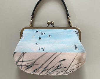 Birds and reeds, velvet clutch bag with optional strap