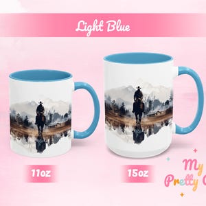 Light blue Cowboy tea cup with a colorful Western design, showing 11 oz and 15 oz options