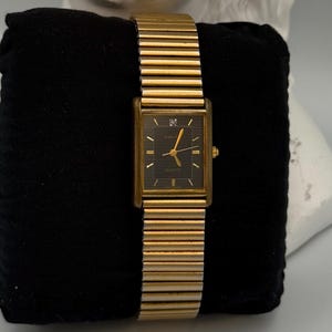 Vintage Gruen Ladies Tank Watch 227-2035 - Rectangular Gold Tone Case with Black Dial & Diamond Accent - Stretch Expansion Band [W-128]