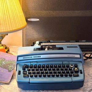 Light Blue Smith Corona Coronet Super 12 Electric Typewriter with Hard Traveling Case With Handle | Vintage Typewriter Working Pristine