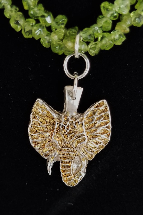 Pendant/Necklace Elephant Fine Silver and Gold Leaf on Peridot Nuggets Chain 18 Inches. 31mm x 24mm x 3mm, Peridot Nuggets 4mm to 6mm.