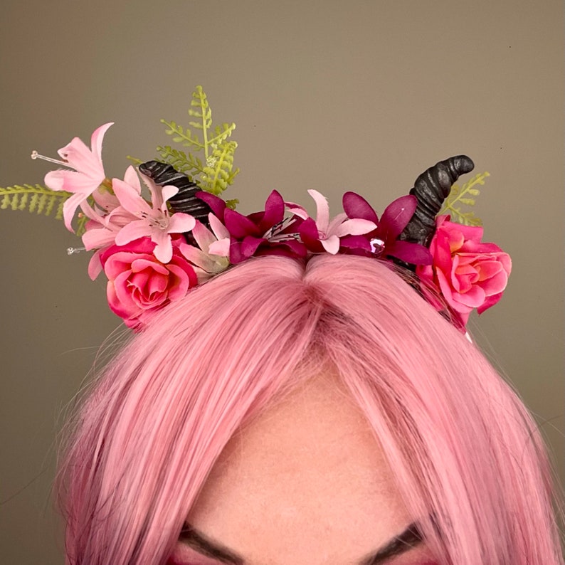 devil horns and pink flower headband