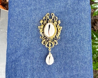 Baroque Gold Brooch with Cowries