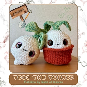 May include: Two crocheted amigurumi turnip plushies, one in a pot. The turnip plushies have white bodies, green leaves, and large, colourful eyes. The pot is orange. The sign above reads "GARDEN".