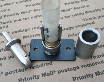 Herramienta para nivelar la parte superior de una caja de calibre 12