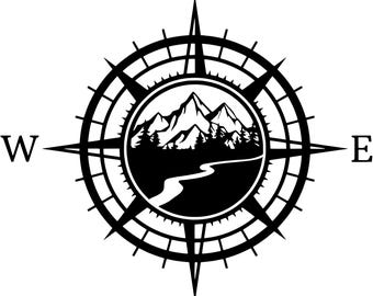 May include: Black and white compass design with a mountain and river scene in the center. The cardinal directions, North, South, East, and West, are clearly marked. The compass has a detailed, decorative outer ring.
