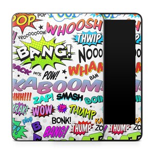 May include: A white comic book-themed tablet case with colorful speech bubbles and sound effects like "BANG!" and "WHOOSH!" The case has a black screen area on the right side.