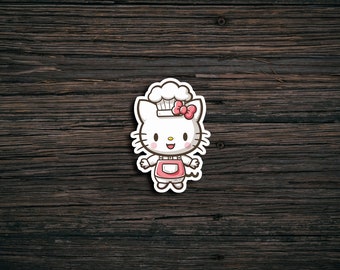 May include: A white cartoon cat wearing a chef's hat and apron, with a pink bow on its head. The cat is smiling and has a happy expression. The background is a dark brown wooden surface.