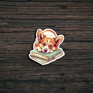 Cute Corgi Laying On A Book Sticker I Cute Sticker | Waterproof | Laptop | Water Bottle | Die Cut Sticker | Adorable | Dog Lover