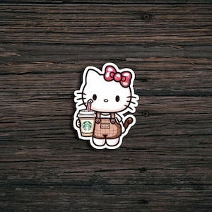 cute cat coffee sticker, kawaii caffeine decal, pink aesthetic meme sticker, cartoon kitty with iced coffee, coffee lover laptop sticker