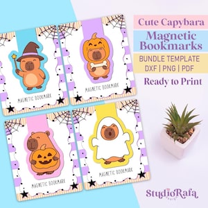Puede incluir: Cuatro marcadores magnéticos con ilustraciones de capibaras con disfraces de Halloween. Cada marcador tiene un diseño diferente: un mago, una calabaza, un fantasma y un capibara sosteniendo una calabaza. El texto "Magnetic Bookmark" está impreso.