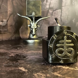 Author&#39;s altar candlestick with candle. Sigil of /Leviathan/Satan/Lucifer/Belial/Astaroth/ Bael/Asmodeus/Lilith Moon/Samael/Baphomet/Mammon