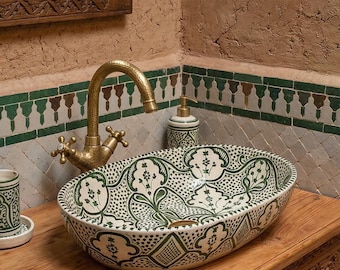 Ceramic handmade sink in emerald green floral for rustic bathroom vanity decor.