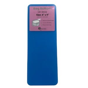 May include: A blue rectangular bag bottom with a pink label. The label reads "Bag Bottom" and "Size: 4" x 11"". Instructions on the label show how to use the product. The product is made from clear acrylic.