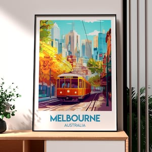 May include: A vintage-style travel poster featuring a yellow tram travelling through a city street lined with tall buildings and autumn trees. The poster has the text "MELBOURNE AUSTRALIA" at the bottom.