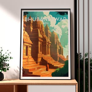 May include: A framed art print showing a stylized illustration of Bhubaneswar, India. The artwork depicts ancient temples in shades of orange and brown, with the city name at the top. The sky is a mix of blue and green.