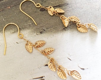 Gold leaf dangle earrings, tiny gold leaves