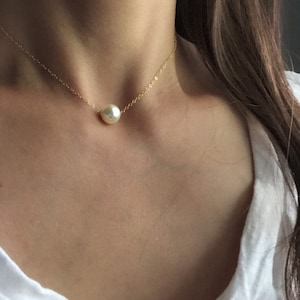 Enkele drijvende parelketting, Zoetwaterparel 10 mm