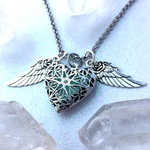 Flying Heart Glow Locket ® with Rose Wings Magic Glow in the dark Jewelry Necklace