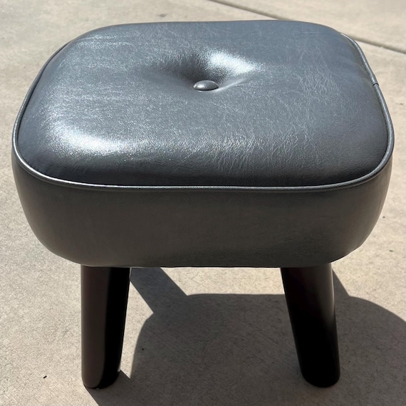 Gray Vinyl MCM Footstool with Dark Wood Legs (12.5x12.5x11 in.)